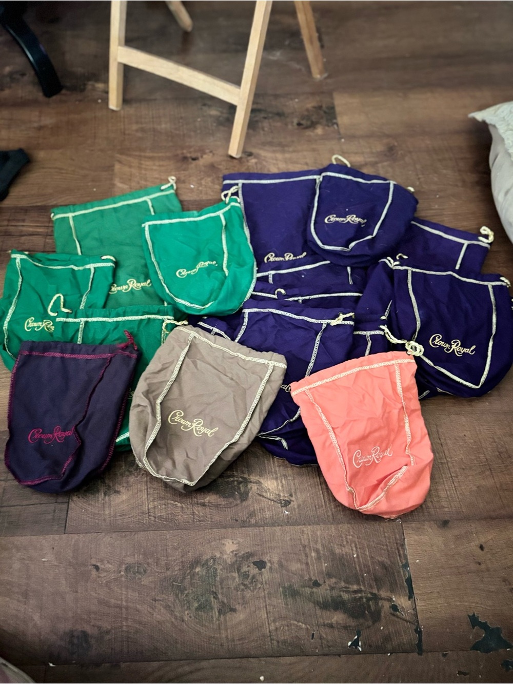 Crown Royal Bags. 1 lg 12 sm Purple, 1 lg 3 sm Green, 1 navy, 1 Vanilla, 1Peach